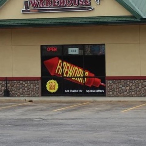 The store window with a sign reading Fireworks Sold Here